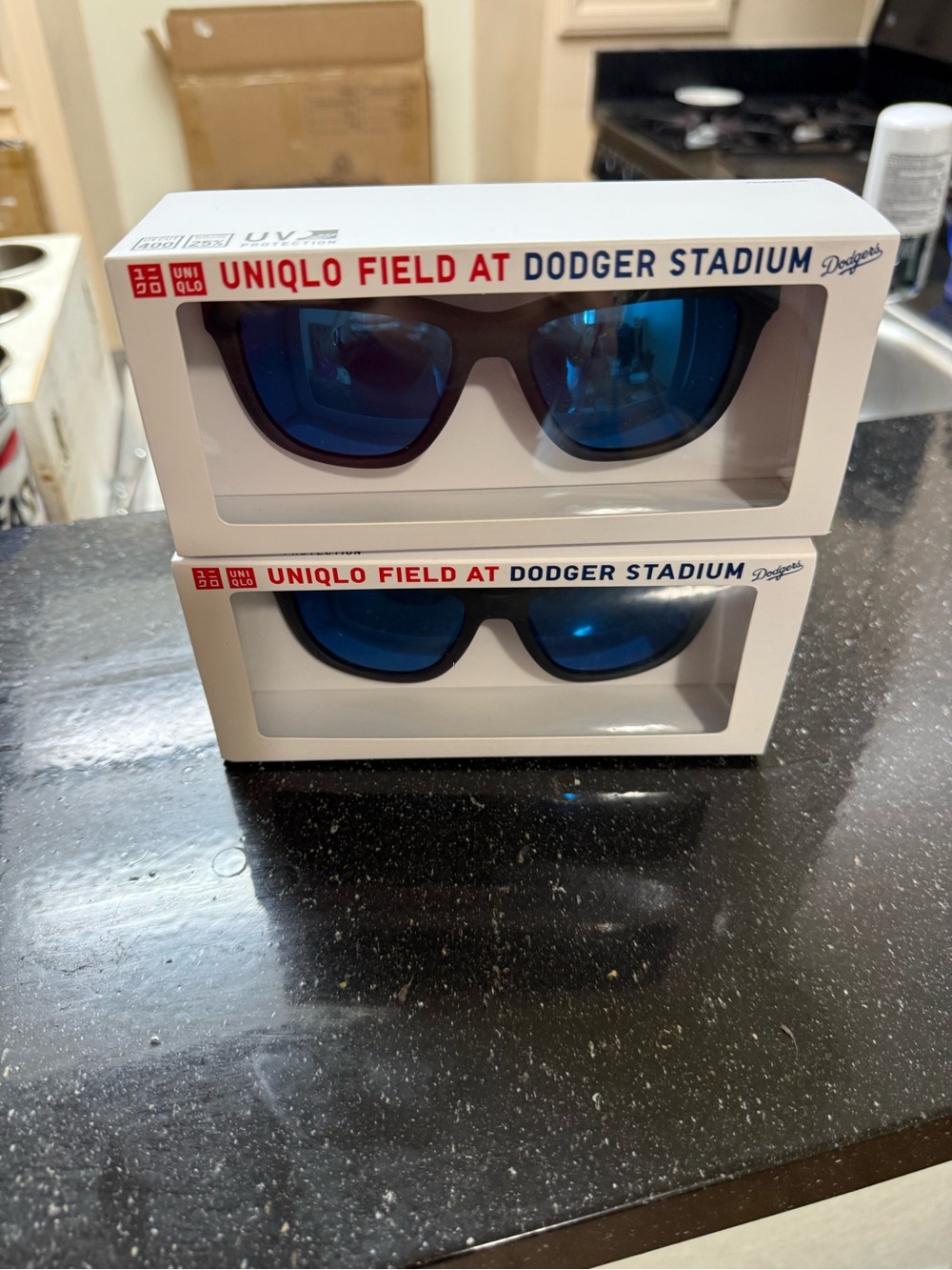 Uniqlo Black Frame Sunglasses with Blue Mirrored Lenses